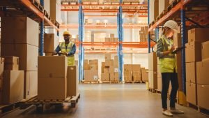 Retail,Warehouse,Full,Of,Shelves,With,Goods,In,Cardboard,Boxes,