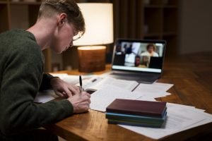 young-man-learning-virtual-classroom